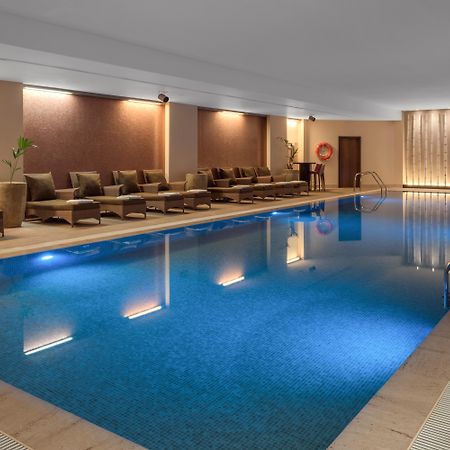 Doubletree By Hilton La Torre Golf Resort Roldán Екстериор снимка The swimming pool at the hotel