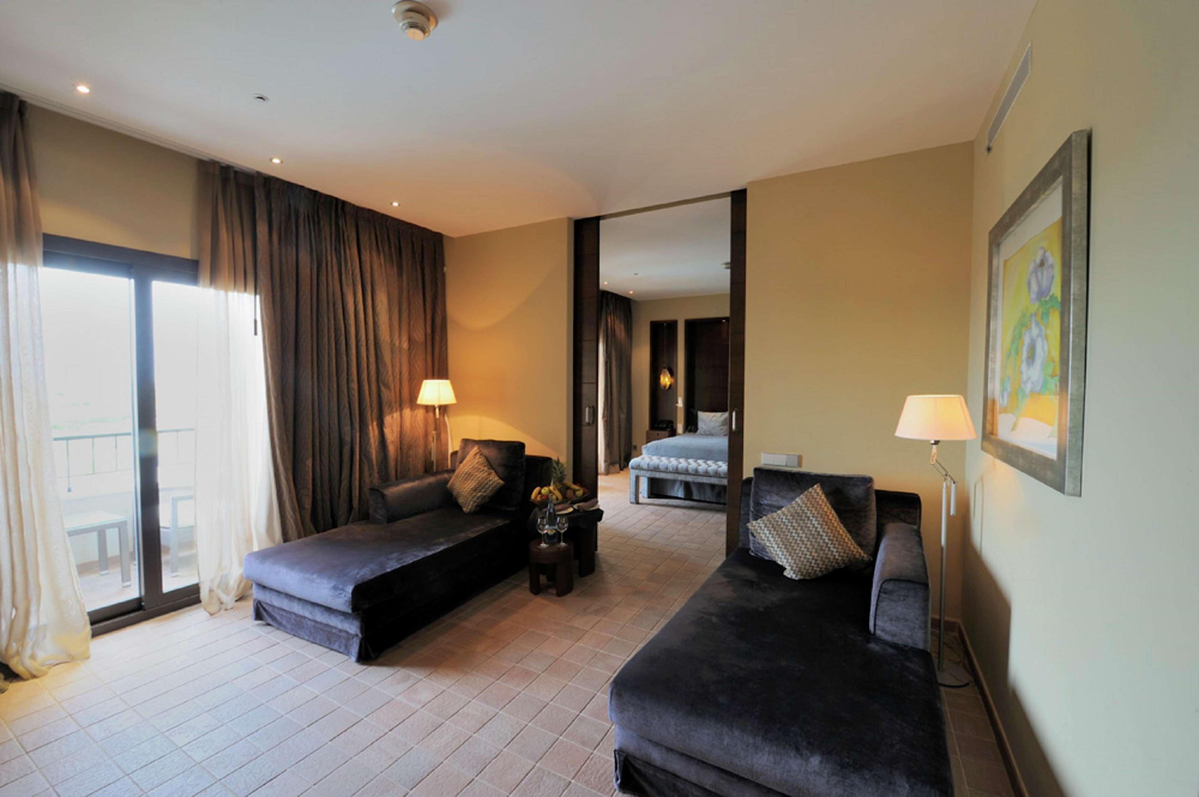 Doubletree By Hilton La Torre Golf Resort Roldán Екстериор снимка A suite at the hotel