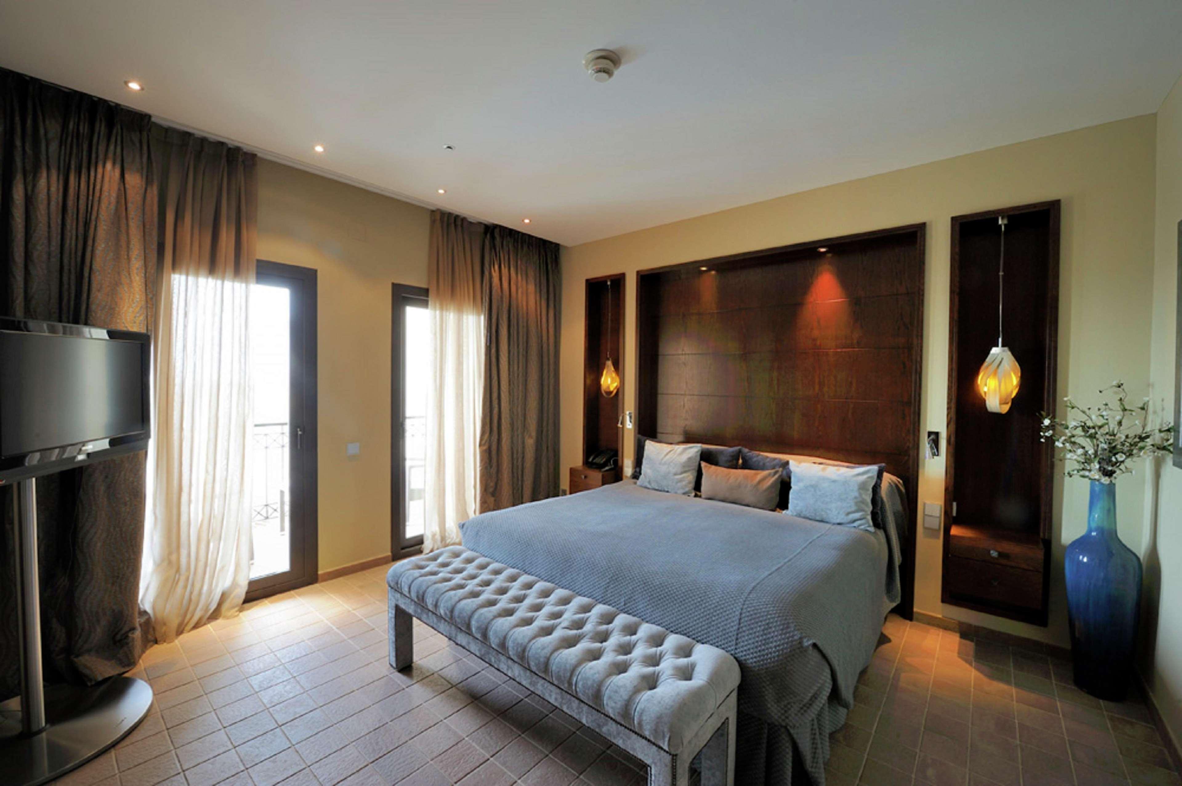 Doubletree By Hilton La Torre Golf Resort Roldán Екстериор снимка A bedroom at the hotel