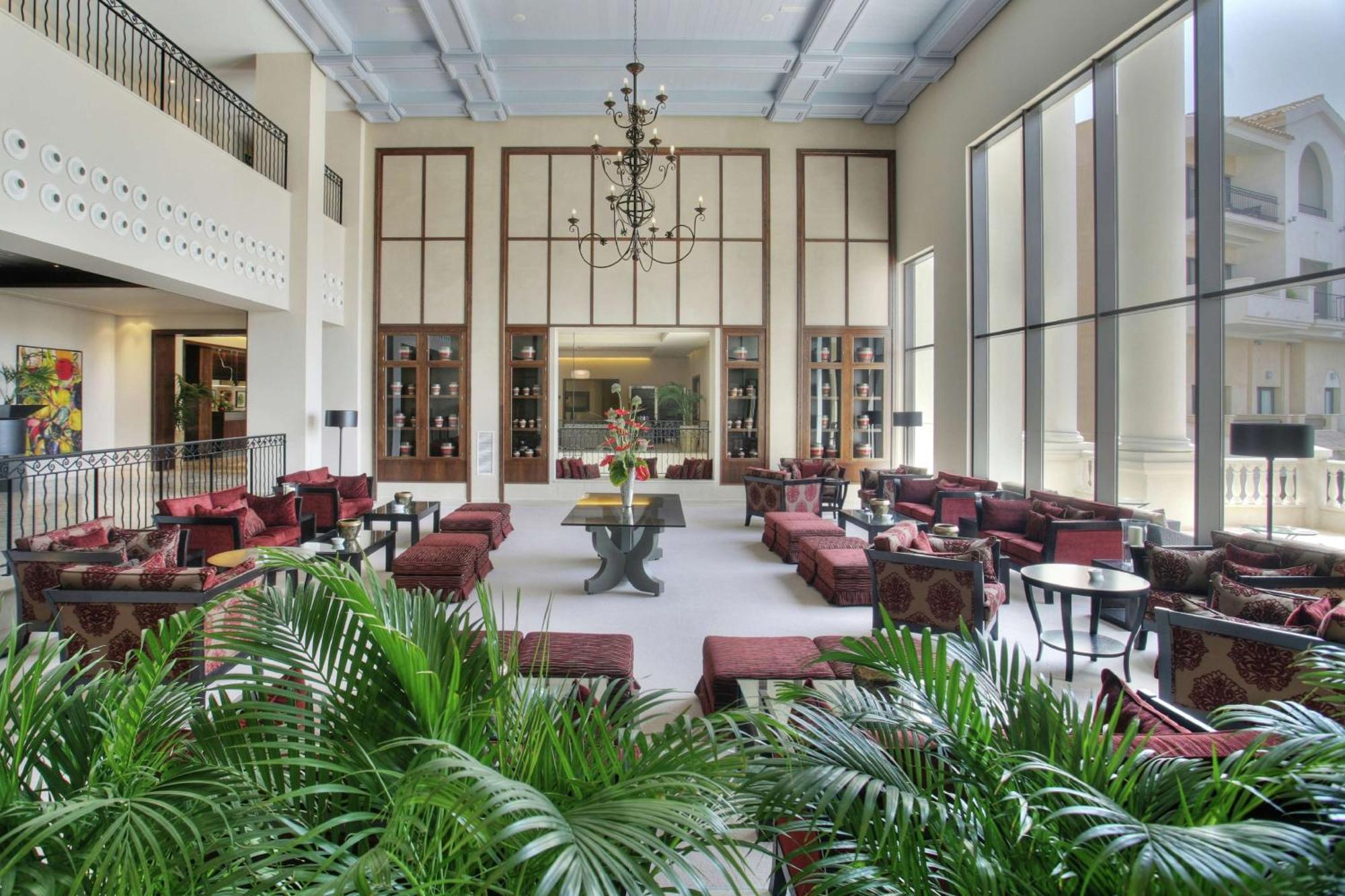 Doubletree By Hilton La Torre Golf Resort Roldán Екстериор снимка The lobby of the hotel
